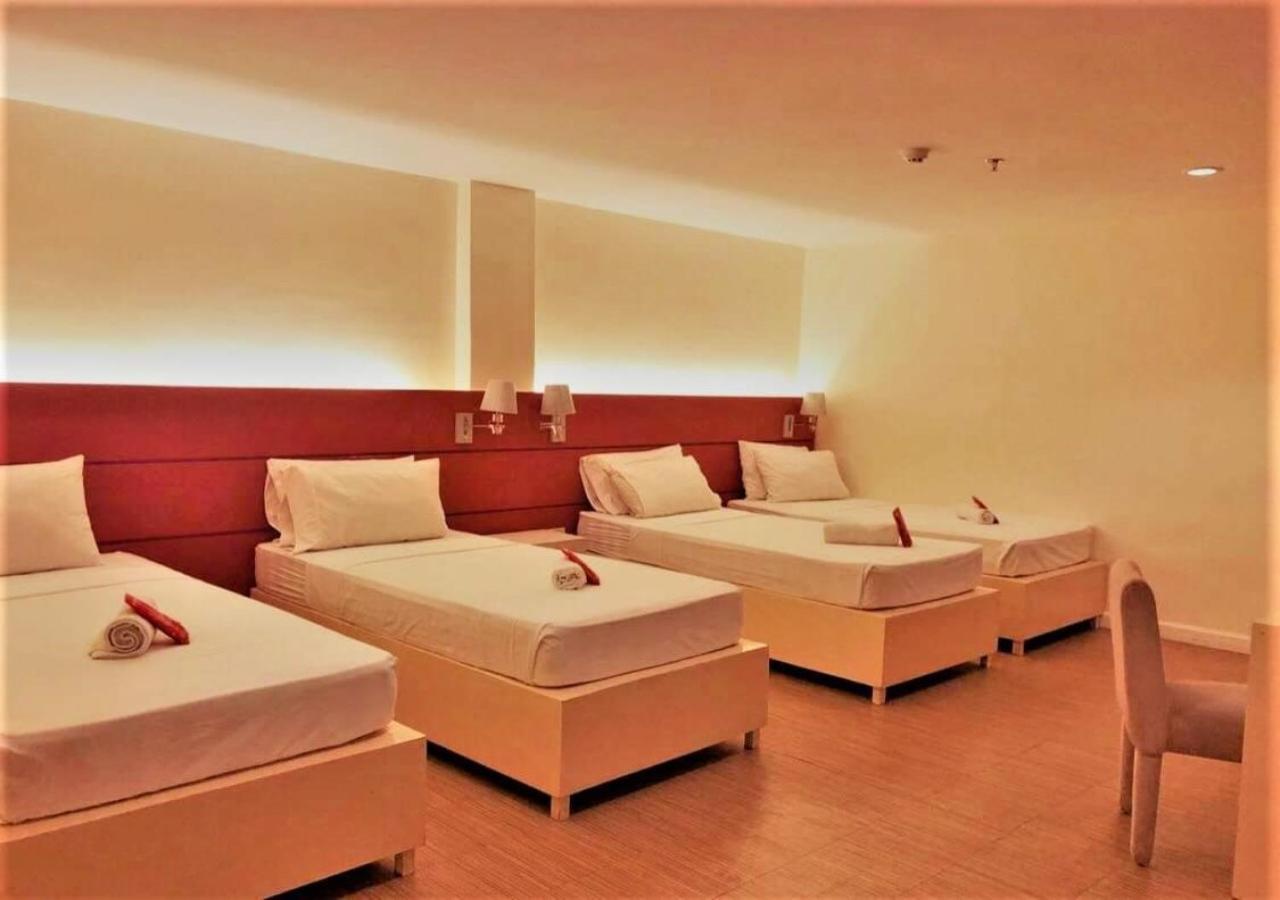เรดดอร์ซ พลัส เนียร์ ไกซาโน มอลล์ กาลิโบ Hotel ห้อง รูปภาพ